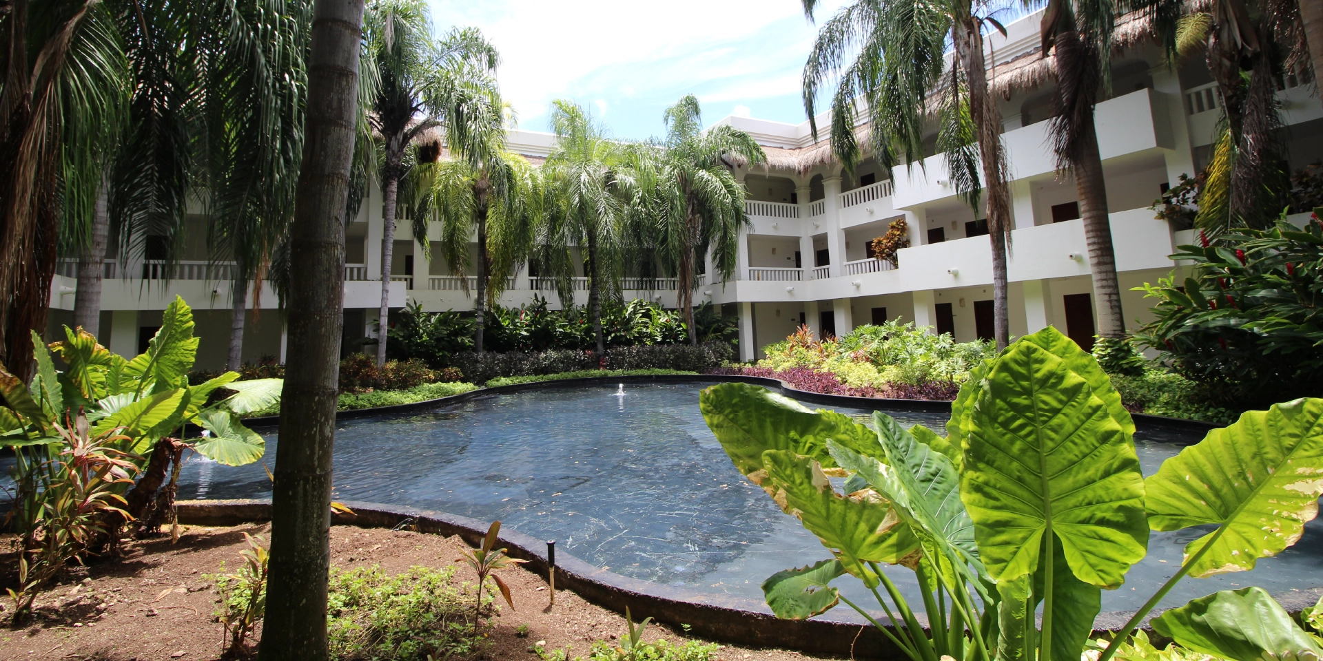 on-vacation-colombia-destination-cancun-hotels-princess-pool-hotel-gardens