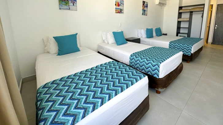 On Vacation Colombia - Hotel Portobelo habitaci&oacute;n acomodaci&oacute;n estandar triple